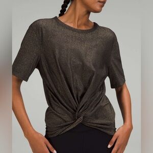 Lululemon Athletica Black and Gold Short Sleeve Tee